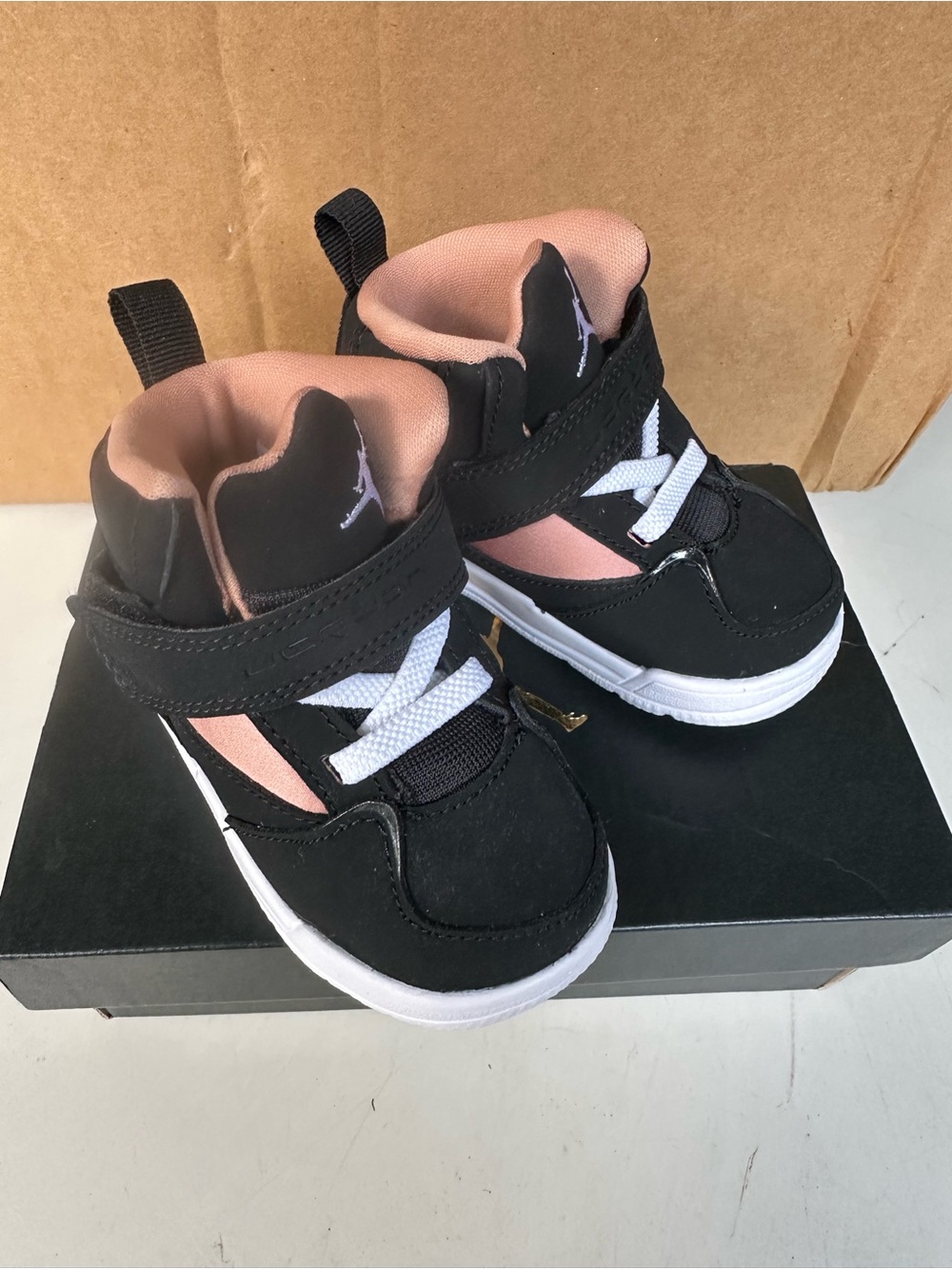 Jordan Kids Black and Pink High-Top Sneakers